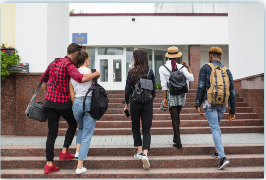College students walking on campus steps