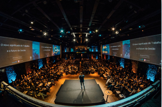 Large conference venue with crowd